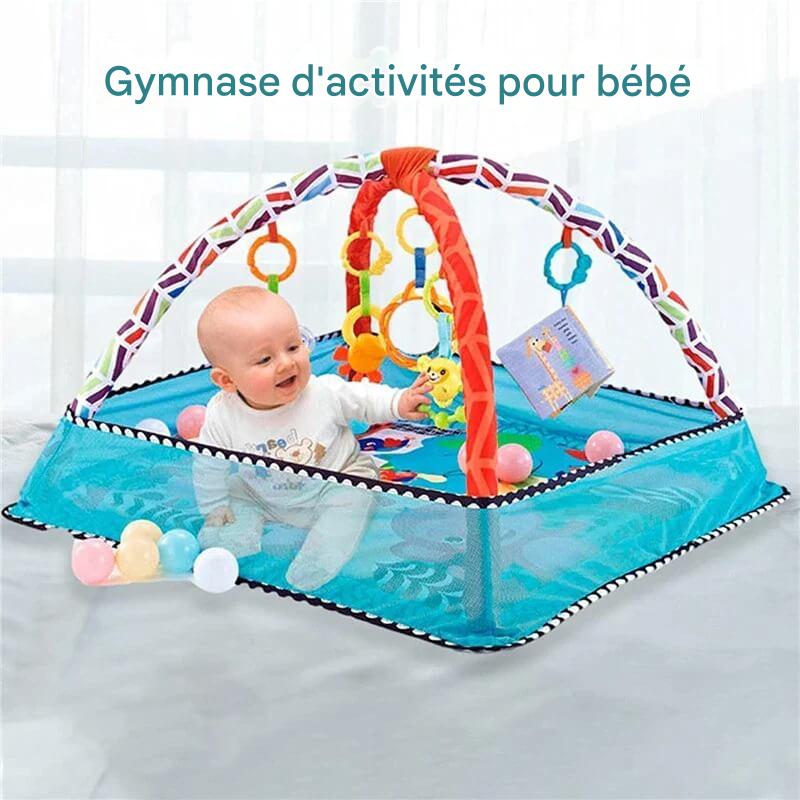 Tapis d'éveil gymnique coloré pour bébé avec jouets suspendus, favorisant le développement moteur et sensoriel.