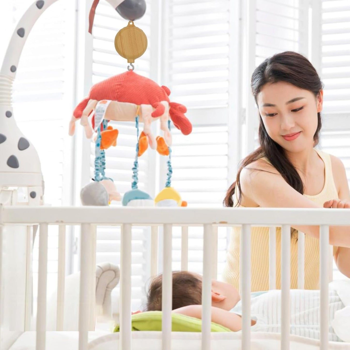 Détail des matériaux non toxiques et sûrs utilisés dans la conception du mobile bébé boîte à musique, pour la tranquillité d'esprit des parents."
