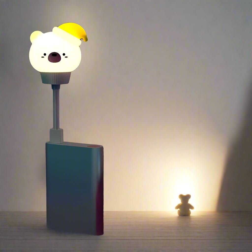 Veilleuse rechargeable SweetDream™ avec contrôle à distance, posée dans une chambre de bébé.
