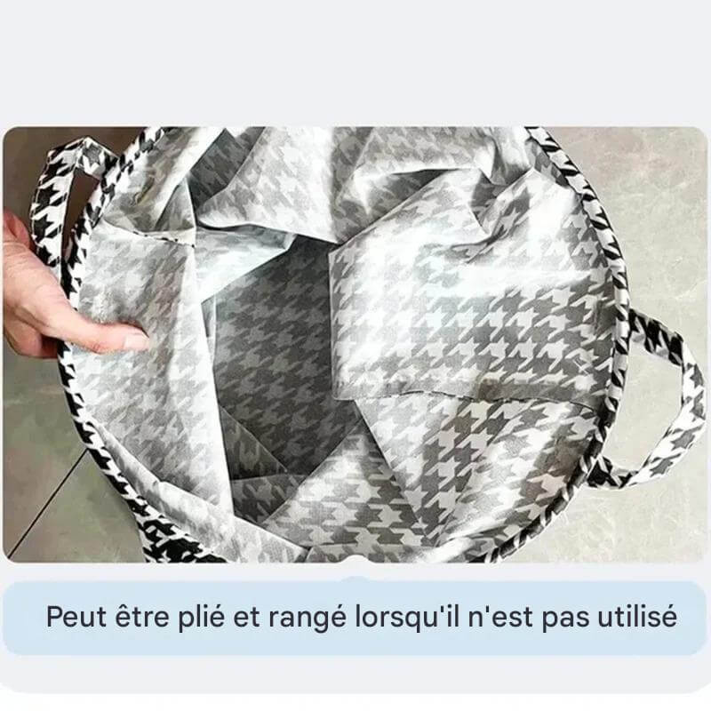 Boîte de rangement pliable pour tissus, compacte lorsqu'elle n'est pas utilisée.