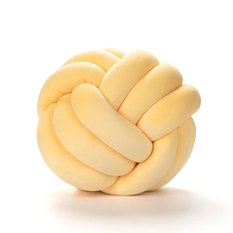 Coussin décoratif pour lit de bébé en forme de nœud de couleur jaune, fabriqué en tissu velours ultra-doux et rembourré en coton PP, idéal pour la sécurité et la décoration de la chambre de bébé.