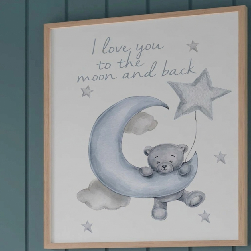 Ourson assis sur un nuage avec étoile dans une décoration murale chambre bébé.