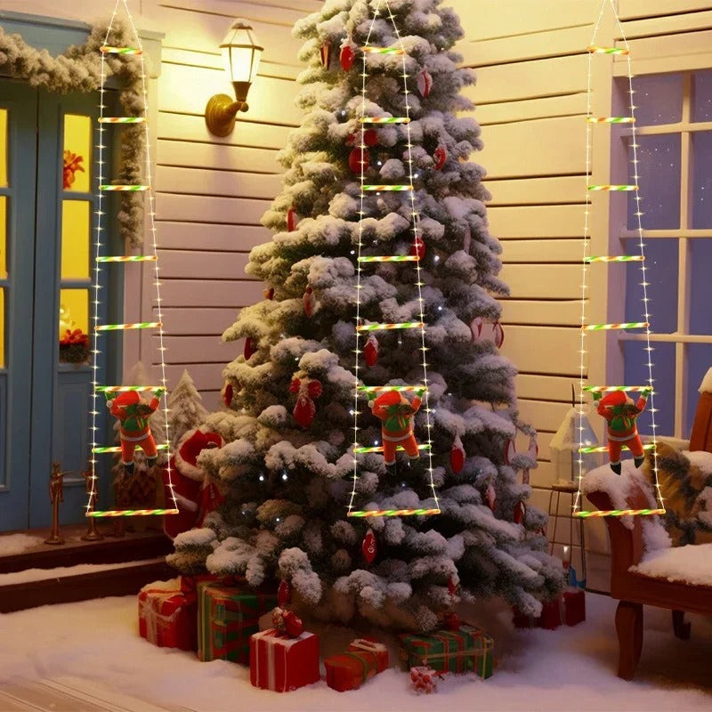 LED Père Noël Escalade™ illuminant la maison avec ses couleurs et son mouvement captivant.