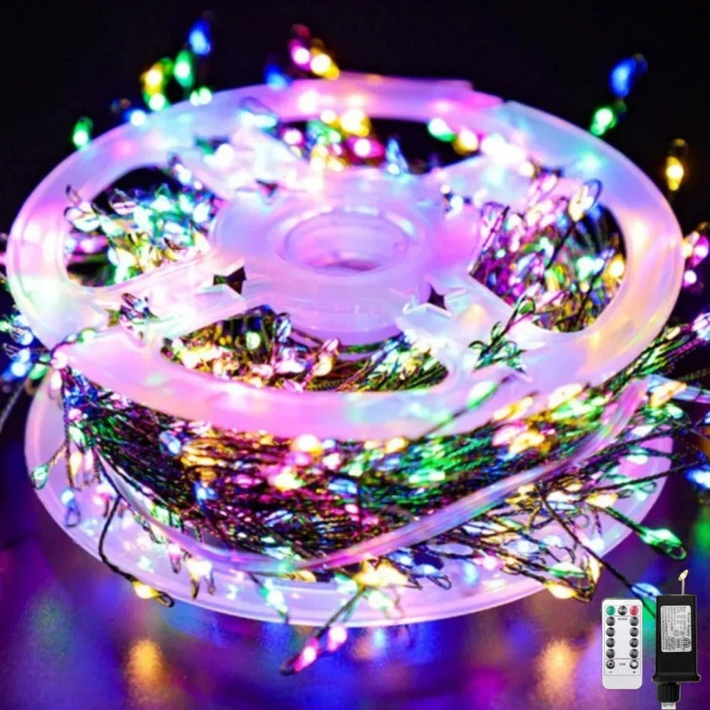 Guirlande LED Lumières Cuivrées™ en mode RVB multicolore, effet festif pour sapin et décoration intérieure."