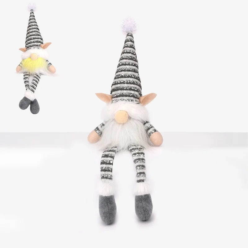 "Lutin de Noël lumineux avec bonnet gris, décoration festive nordique.