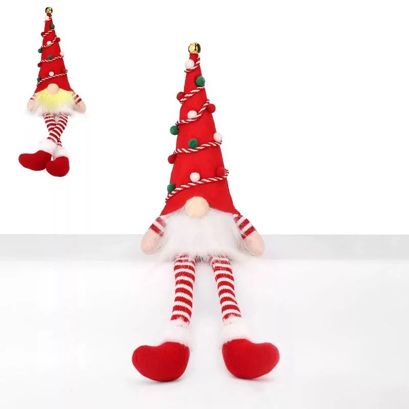 "Lutin de Noël lumineux avec bonnet rouge, décoration festive nordique.