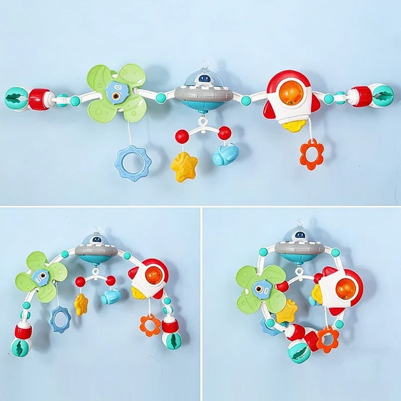 Mobile musical pour bébé Spacea de la collection Douce Mélodie suspendu au lit
