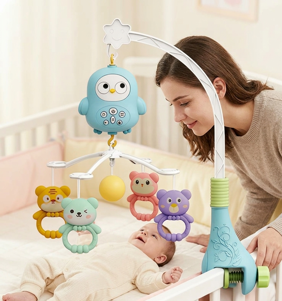 Mobile Musical Bébé Bird Dream™ installé sur un lit bébé avec animaux suspendus colorés