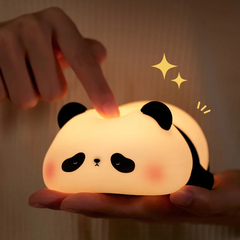 Taper  légèrement sur la veilleuse Panda pour régler la luminosité