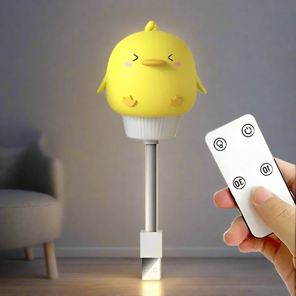 Veilleuse SweetDream™ pour bébé avec télécommande, créant une ambiance relaxante pour les nuits et siestes."